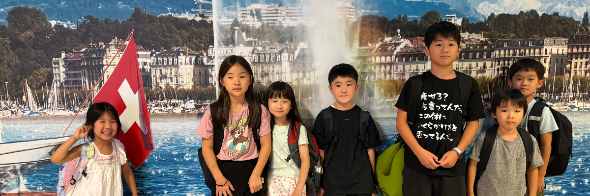 Summer2026_sp_plan_top_2 2025年ジュネーブ空港到着時のスイスサマースクールに参加する日本人幼稚園児・小学生男女7名